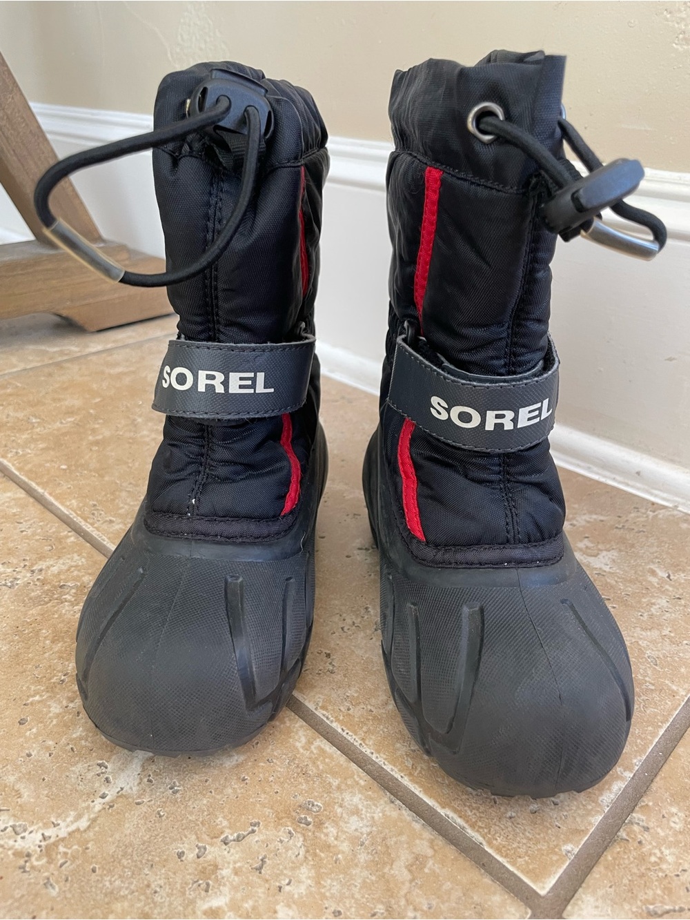 Sorel Kids Black Snow Boots with Red Trim